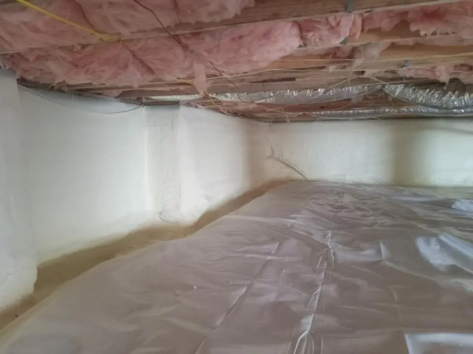 Crawl space encapsulation with closed-cell spray foam for Commercial Roof Restoration in St. Robert